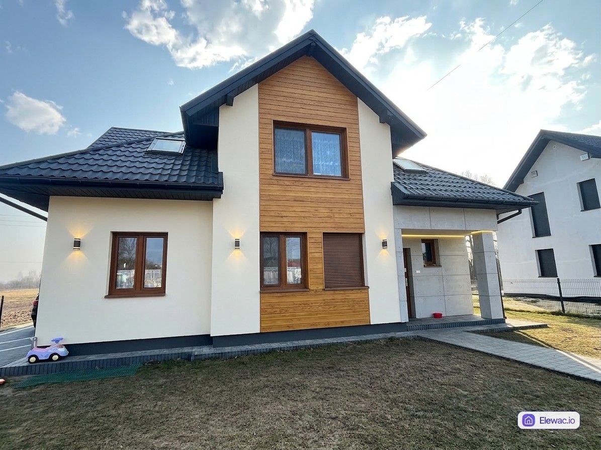 Dom po remoncie elewacji — nowoczesny tynk silikonowy, modrzew termo i beton architektoniczny