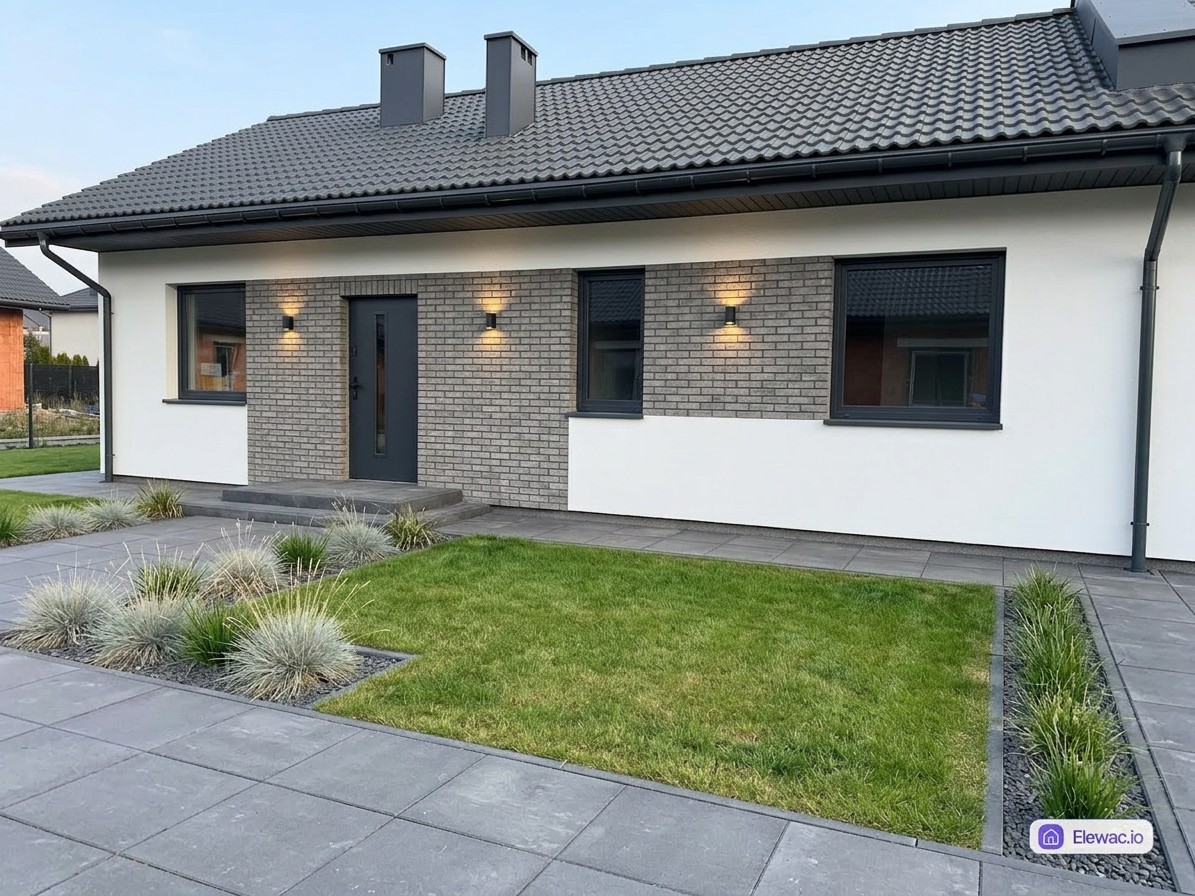 Dom jednorodzinny po wykonczeniu elewacji — bialy tynk silikonowy i szara plytka klinkierowa